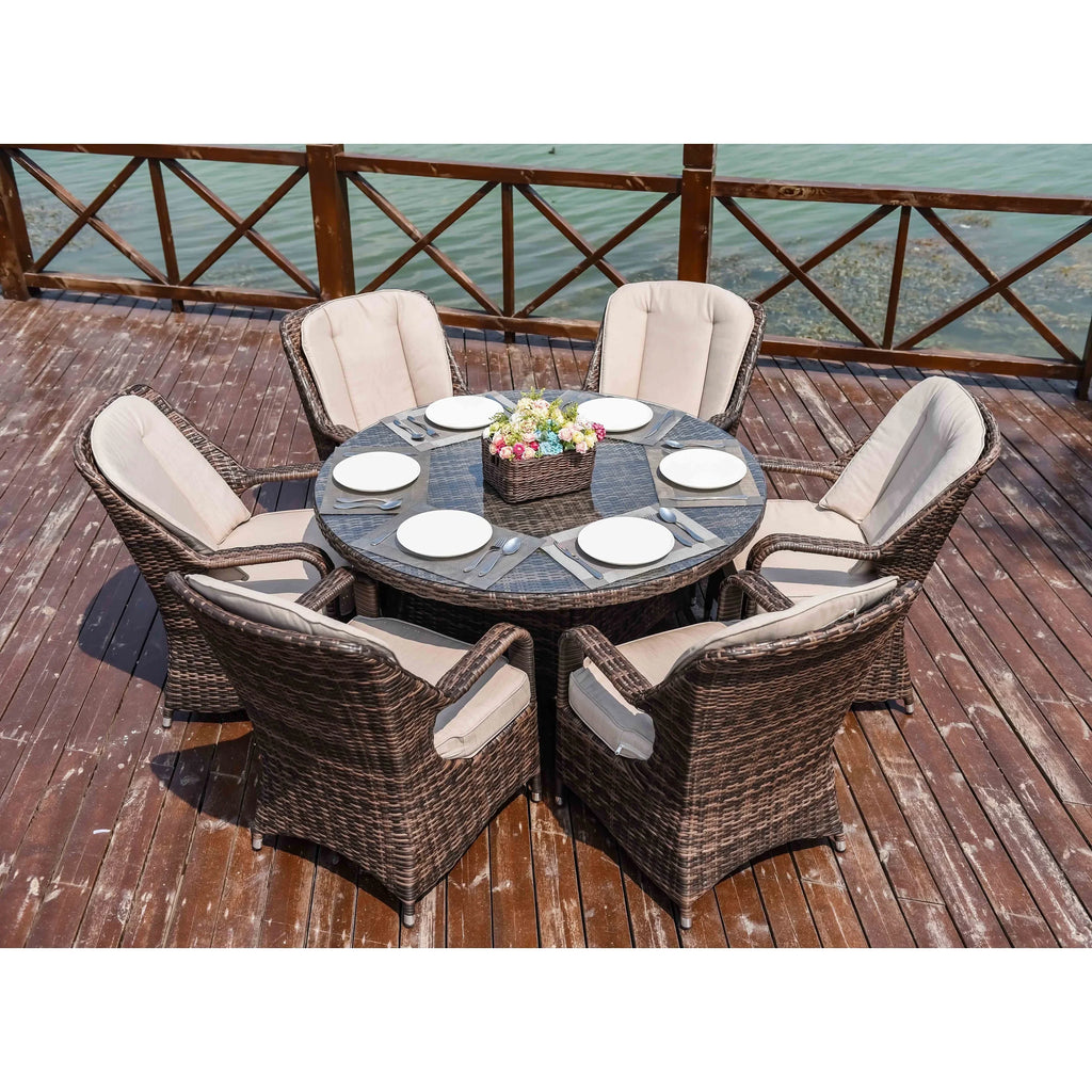 Set da pranzo rotondo da esterno in rattan intrecciato da 7 pezzi con cuscini di Moda Furnishings