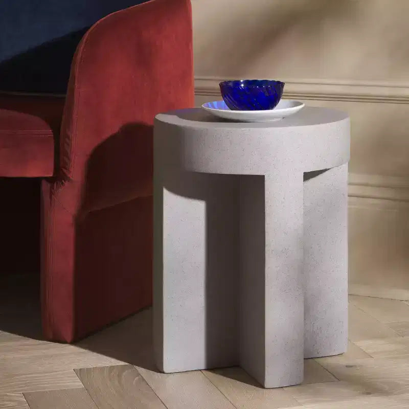 Round Accent Table – White Sculptural Cross Base, Modern Indoor Design