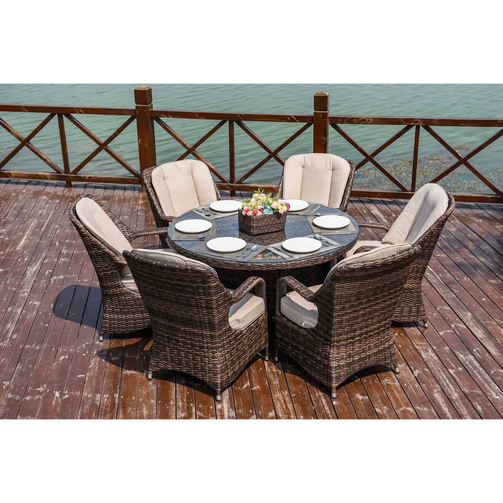 Set da pranzo rotondo da esterno in rattan intrecciato da 7 pezzi con cuscini di Moda Furnishings