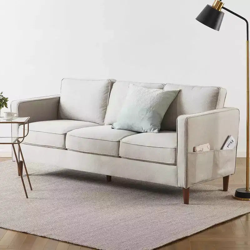 Divano moderno in lino con tasche sui braccioli
