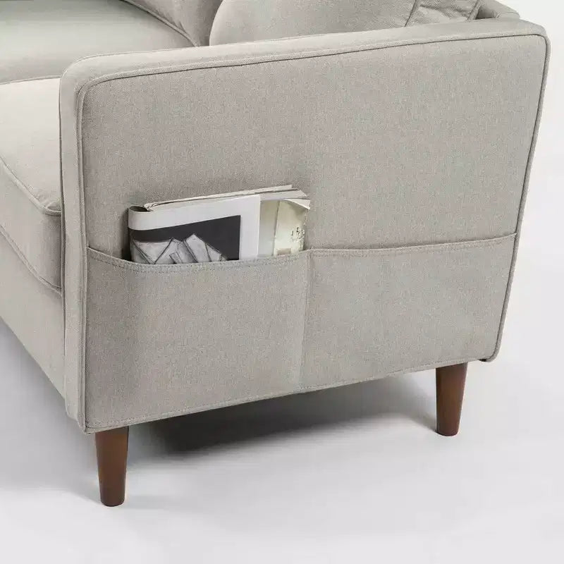 Divano moderno in lino con tasche sui braccioli